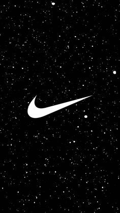 a black and white photo of a nike logo on a starry night sky with stars