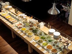 a buffet table with many different types of food on it