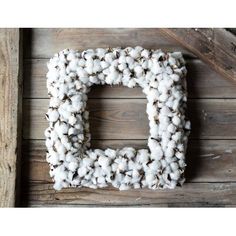 the letter d is made out of cotton balls