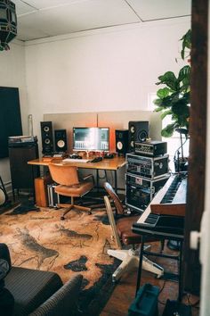 a room filled with lots of musical equipment