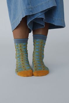 Keep your feet cozy and boho-chic in our Sunny Bloom Socks, these will add such a cute boho touch to your cold weather looks and get so many compliments! So cozy, medium-weight, fabric with so cute floral mix print Beautiful multi-color yarn throughout Perfect for everyday wear for warmth and boho style Pair with: Eye Of The Sun Padded Bralette, Ethereal Shine Stacked Bracelet and Washed Ashore Ruffled Maxi Skirt and Shoreline Platform Sandals. *Due to lighting and differences in monitors, actua Ruffled Maxi Skirt, Needs Vs Wants, Boho Essentials, Washed Ashore, Bralette Outfit, Ruffle Maxi Skirt, Padded Bralette, Cute Accessories, Cute Socks