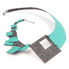 Faux Leather Necklace - This eye-catching statement necklace features a fascinating asymmetrical design and displays movement thanks to the dancing squares that wrap around the neck. Crafted from faux leather made from recycled coconut husks, this hand-painted necklace is eco-friendly and waterproof. 21 chain with 1 extension included; lobster clasp closure. Faux Leather Necklace, Painted Necklace, Mixed Media Necklace, Hand Painted Necklace, Square Necklace, Artful Home, Asymmetrical Design, Leather Necklace, Leather Craft