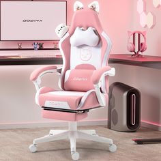 a pink and white computer chair in front of a monitor