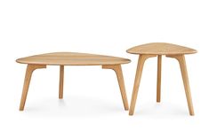 two wooden tables sitting next to each other