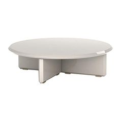 a white table with two silver legs and an oval shaped top, on a white background