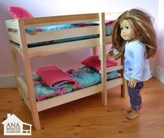 a doll standing next to a bunk bed