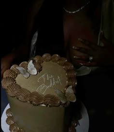 there is a cake with writing on it