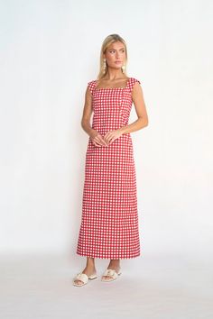 Your summer daiquiri has been served! This lightweight cotton dress is the perfect go to for your next brunch or cocktail party. The removable cape adds a touch of sophistication, allowing you to dress up or down with ease. COMES WITH RED GINGHAM CAPE Fashion Backgrounds, Court Dresses, Fashion Background, Playing Golf, Daiquiri, Red Gingham, Gingham Dress, Gingham Print, Lifestyle Brand