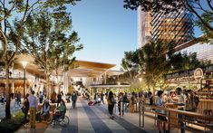 an artist's rendering of the planned shopping mall at dusk, with people walking and sitting on benches