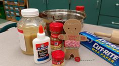 the ingredients for making gingerbread cookies are sitting on the kitchen counter next to baking utensils