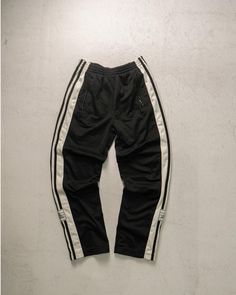 Vintage 90s Adidas Pants, Mens Black Pants, Pre-owned Pants, Tearaway Track Pants - Women's Small, Womenswear Size On Label: Large  Recommended Size: Women's Small  Measurements: Waist: 26" - 34" Inseam: 26" 90s Style Black Sports Pants, Black Full-length 90s Style Pants, Nike 90s Track Pants, Vintage Nike Track Pants, 90s Adidas Track Pants, Adidas Hose, Adidas Vintage, Track Pants Women, Black Pants Men