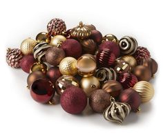 a pile of christmas ornaments sitting on top of each other