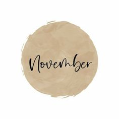 the word november written in cursive writing on a beige circle with black ink