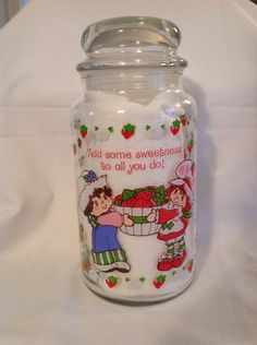 a glass jar filled with lots of candy