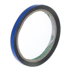 a roll of blue tape is shown on a white background with green and gray stripes