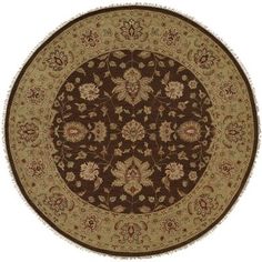 a brown and beige rug with floral designs on the center, in an oval shape