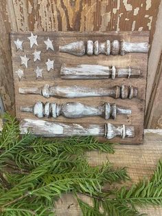 an american flag made out of wood and some branches