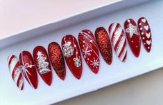 Sparkle this season with our Glitter Diamond in Red Christmas press on nails! These custom, reusable pressons offer a dazzling festive look. Perfect for holiday glam, they’re easy to apply and add instant shine to your nails!📦 What comes with your press on nail kit? 10 nails of your size 24 adhesive tabs 1 nail file 1 cuticle stick Instructions on how to apply and remove them. Finding Your Size:Check out our sizing chart or Visit our sizing tutorial here: Sizing DirectionsNot sure about the siz Christmas Nail Art Designs Snowflakes Red, Christmas Nails Elegant Red, Christmas Ball Nails, Red Rhinestone Christmas Nails, Red Bling Christmas Nails, Festive Nails Christmas Sparkle, Festive Christmas Nails Red, Christmas Present Nail Designs, Christmas Plaid Nails Design