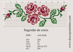 a cross stitch pattern with pink flowers on the side and green leaves in the middle