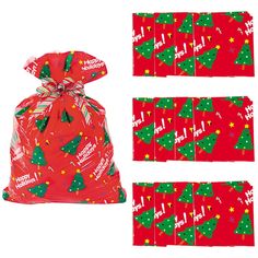 three bags with christmas trees on them and one bag filled with candy canes next to it