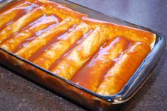 a pan filled with food sitting on top of a counter