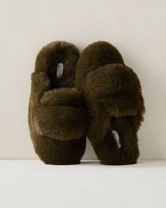 A timeless slipper silhouette in super soft faux fur on a soft, padded footbed. Pair them with your favorite off-duty look and slide into relaxation mode. If you typically wear a half-size, size down for a more comfortable fit. Details + Design: Slip on. Material: 100% PolyesterImported | Faux Fur Slippers Haven Well Within Casual Faux Fur Slippers, Flat Faux Fur Slippers, Brown Casual Faux Fur Slippers, Fluffy Faux Fur Slip-on Slippers, Comfortable Slip-on Faux Fur Slippers, Faux Fur Slippers, Fur Slippers, Goyard Bag, Makeup Clothes