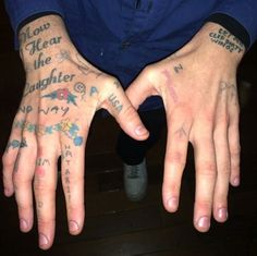 two hands with different tattoos on them