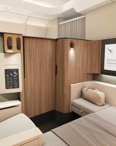 the inside of an airplane cabin with two beds