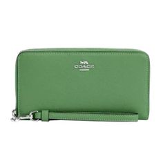 New With Tags 100% Authentic Coach C4451 Long Zip Around Wallet Soft Green With Silver Tone Hardware Refined Pebble Leather Zip-Around Closure Detachable Wrist Strap Inside Zip Coin Pocket, 12 Credit Card Slots, Full-Length Bill Compartments Length: 7 1/2" Height: 4" Depth: 1" Coach Leather Wallet, Coach Leather Clutch Wallet, Coach Green Wallet For Everyday Use, Green Coach Wallet For Everyday Use, Green Wallet With Card Slots, Coach Wallets With Zipper Closure, Green Leather Wallets With Zipper Closure, Coach Leather Wallet For On-the-go, Green Coach Bags With Silver-tone Hardware