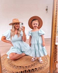 Our Mommy and Me dresses are made of soft and comfortable fabric that both you and your little one will surely love. The light blue color is perfect for any occasion, and the puff sleeves add a feminine and elegant touch, making you and your little one look absolutely adorable in these matching outfits. I T E M D E S C R I P T I O N  * Fit Type: True to Size * Fit Style: Tiered Dress Flowy * Length: Mini * Material: 95% Polyester 5% Spandex * No zipper * This dress includes lining * Front and ba Matching Outfits For Mom And Daughter, Spring Family Outfits, Mommy And Me Outfits Dresses, Mom And Daughter Matching Outfits, Matching Mommy Daughter Outfits, Daughter Photo Ideas, Mother Daughter Dresses, Mom And Baby Outfits, Mom Daughter Outfits