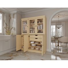 an empty dining room with white walls and marble flooring