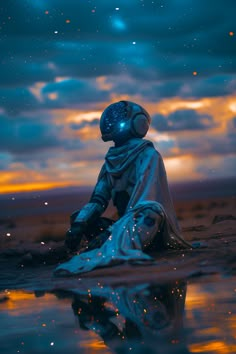 an astronaut sitting on the ground in front of a body of water with stars above it