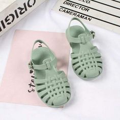 Green / 17cm Roman Slippers Summer Beach T-strap Closed Toe Sandals, Casual Green Flat Heel Sandals, Casual Green Flat Sandals, Casual Closed Toe T-strap Sandals For Beach Season, Casual Closed Toe T-strap Sandals For Beach, Non-slip Jelly Sandals For Spring, Closed Toe Plastic Sandals For Party, Party Closed-toe Plastic Sandals, Synthetic Closed Toe T-strap Sandals For Summer