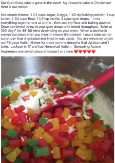 a bowl filled with lots of gummy bears next to a red spoon in it