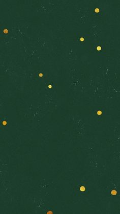 a green background with gold dots on it