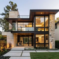 a large modern house with lots of windows