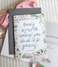 a card with the words beauty begins the moment you decide to be yourself on it