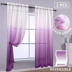 purple and white curtains hanging on the wall in front of a window with two pictures above it