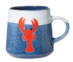 a blue and white mug with a red lobster on it