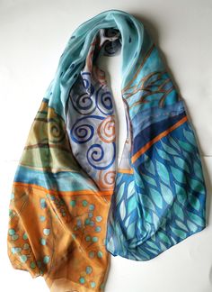 A new hand painted silk scarf in blue brown color harmony. Decorative hand painted long scarf. Klimt inspired shawl, Klimt motives, Designer silk scarf painted in swirls, leaves and plants motives. Evening Blue Brown shawl in Art deco style. Luxury gift for teacher, Gift for art lover woman Birthday gift for mom, for sister, Mother in low gift ♥ size is 35 by 70 inches This beautiful Rusty blue scarf is painted on pure silk pongee 5 A silk scarf will give a perfect finishing touch to any outfit, Blue Hand Painted Silk Scarf, Bohemian Blue Hand Painted Silk Scarf, Blue Hand Painted Bohemian Silk Scarf, Blue Bohemian Hand Painted Silk Scarf, Artistic Blue Silk Scarves, Artistic Blue Silk Scarf, Artsy Blue Art For Collection, Brown Shawl, Designer Silk Scarves