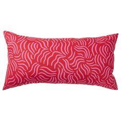 a red and white pillow with wavy lines on the front, sitting on a white background