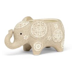 an elephant planter with intricate designs on it