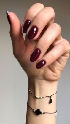 Discover chic and professional office nails to elevate your workday style. Explore elegant designs and colors perfect for any corporate setting! Wine Color Almond Nails, Burgundy Almond Nails Short, Moody Almond Nails, Fall Red Almond Nails, Red Gel Nails Almond, Gel Almond Nails Ideas, Almond Outfit, Maroon Almond Nails, Dark Almond Nails