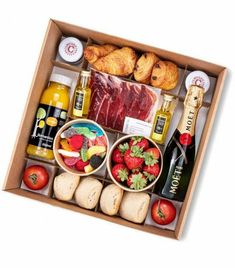 a wooden box filled with food and condiments