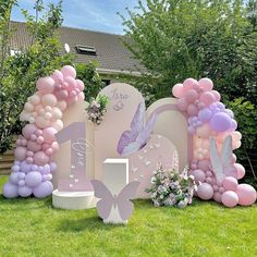 some balloons and decorations in the grass