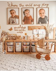 a baby's room with three pictures on the wall and toys in baskets next to it