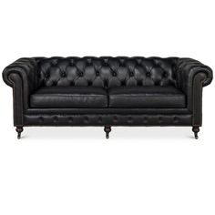 a black leather couch with buttons on the back and arms, in front of a white background