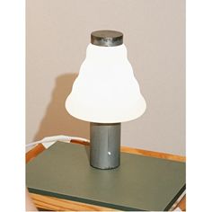 a lamp that is on top of a table