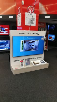 an electronic display in the middle of a store