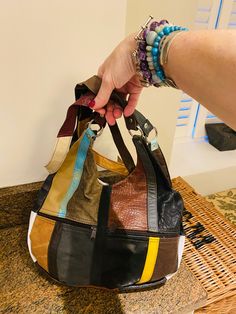 This is a really lovely patchwork leather handbag, in good condition.  The dimensions are 11 x 14 x 2 inches and it has various zippers on the outside and inside.  It is a shoulder bag but could also be used as a clutch.  Great!! (534.) (w.et) Multicolor Leather Patchwork Shoulder Bag, Patchwork Hobo Bag For Everyday Use, Brown Patchwork Hobo Bag, Brown Rectangular Hobo Bag With Patchwork, Brown Patchwork Hobo Bag For Daily Use, Patchwork Satchel Hobo Bag For Everyday Use, Multicolor Patchwork Satchel For Everyday Use, Patchwork Satchel Hobo Bag For Daily Use, Daily Use Patchwork Satchel Hobo Bag